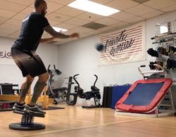 Tighten Your Core and Increase Stability with Rebounder Throw and Catch on StrongBoard Balance Board